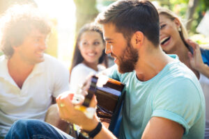 man with beard in blue shirt with guitar deposit photo 10 21 22