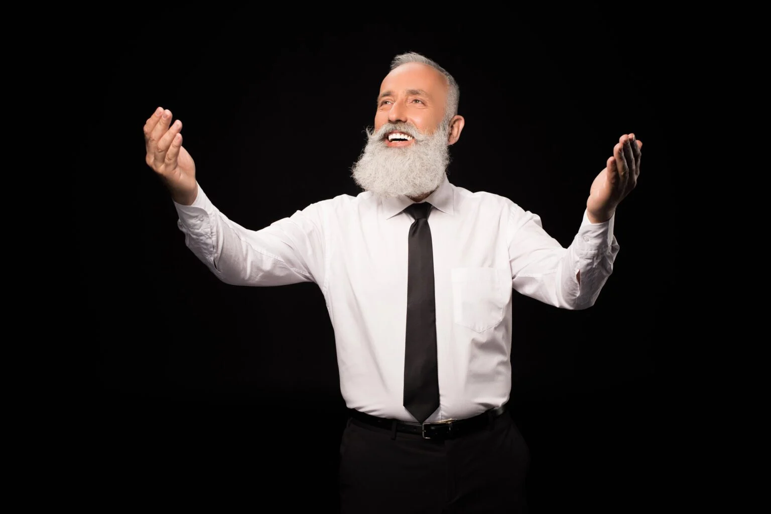 man-with-arms-outstretched-white-shirt-black-tie-white-beard-deposit-photo-May-2025-1536x1025